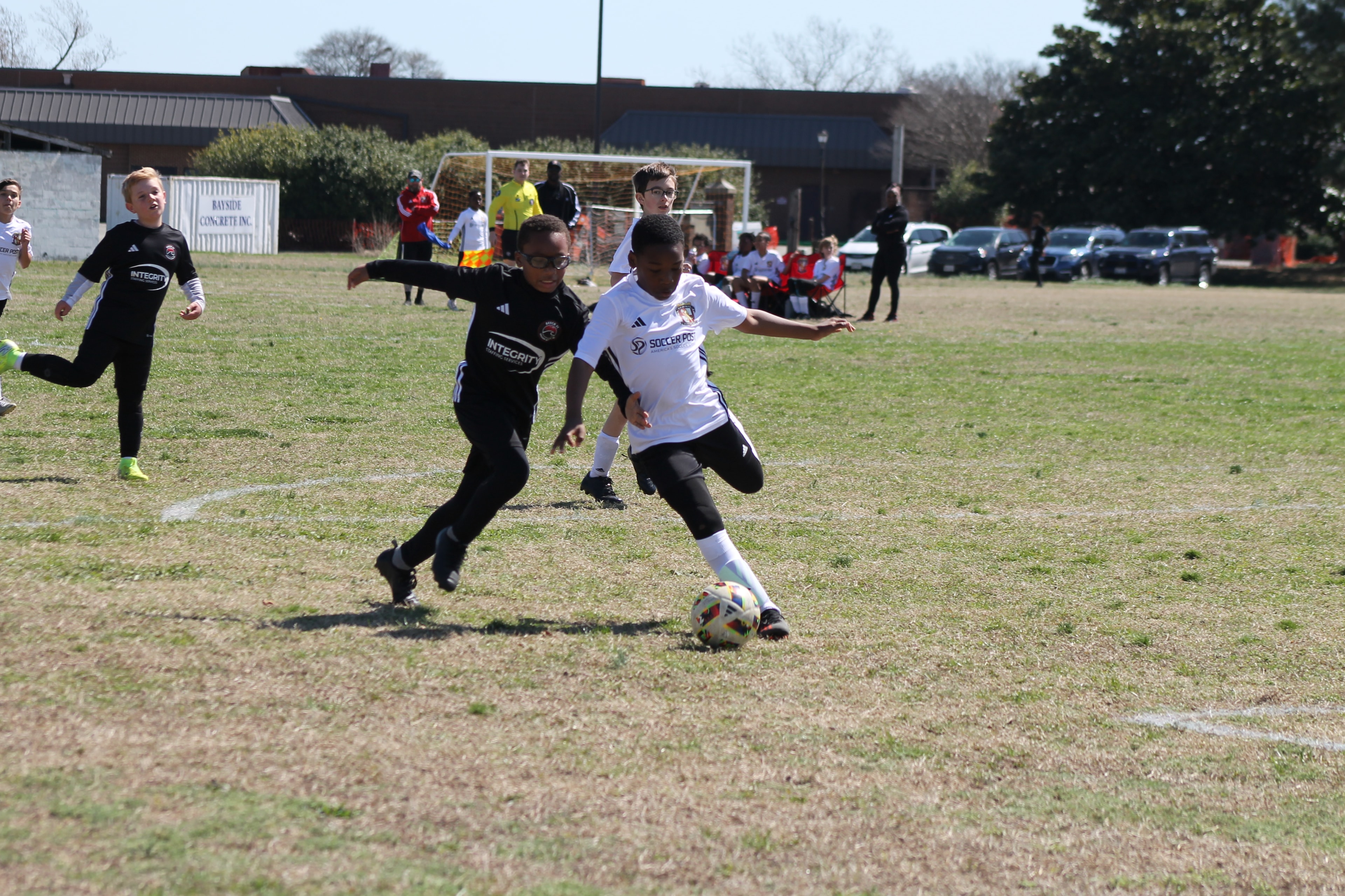 VIP United FC coach working with players